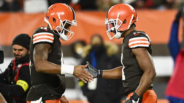 Dec 17, 2022; Cleveland, Ohio, USA; Cleveland Browns quarterback Deshaun Watson, left, celebrates with wide receiver Donovan Peoples-Jones after Peoples-Jones caught a touchdown pass during the second half against the Baltimore Ravens at FirstEnergy Stadium. Mandatory Credit: Ken Blaze-USA TODAY Sports